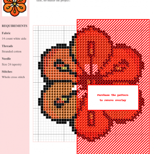Cross stitch pattern featuring a stylized orange lily flower with yellow stamens and a white center.