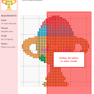 Image of a charming cross-stitch pattern depicting a kawaii-style trophy decorated with an Easter egg on top.
