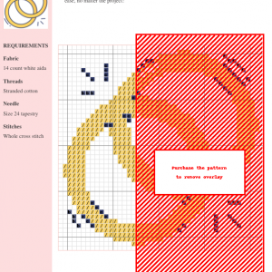 Cross stitch pattern design featuring two interlocking gold rings, symbolizing marriage or commitment.