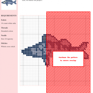 Cross stitch pattern featuring a detailed design of a zander fish in shades of blue and cream.