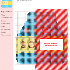 Cross stitch pattern depicting a cute, cartoon soy milk carton with a smiling face. Light blue, yellow, and pink colors are used.